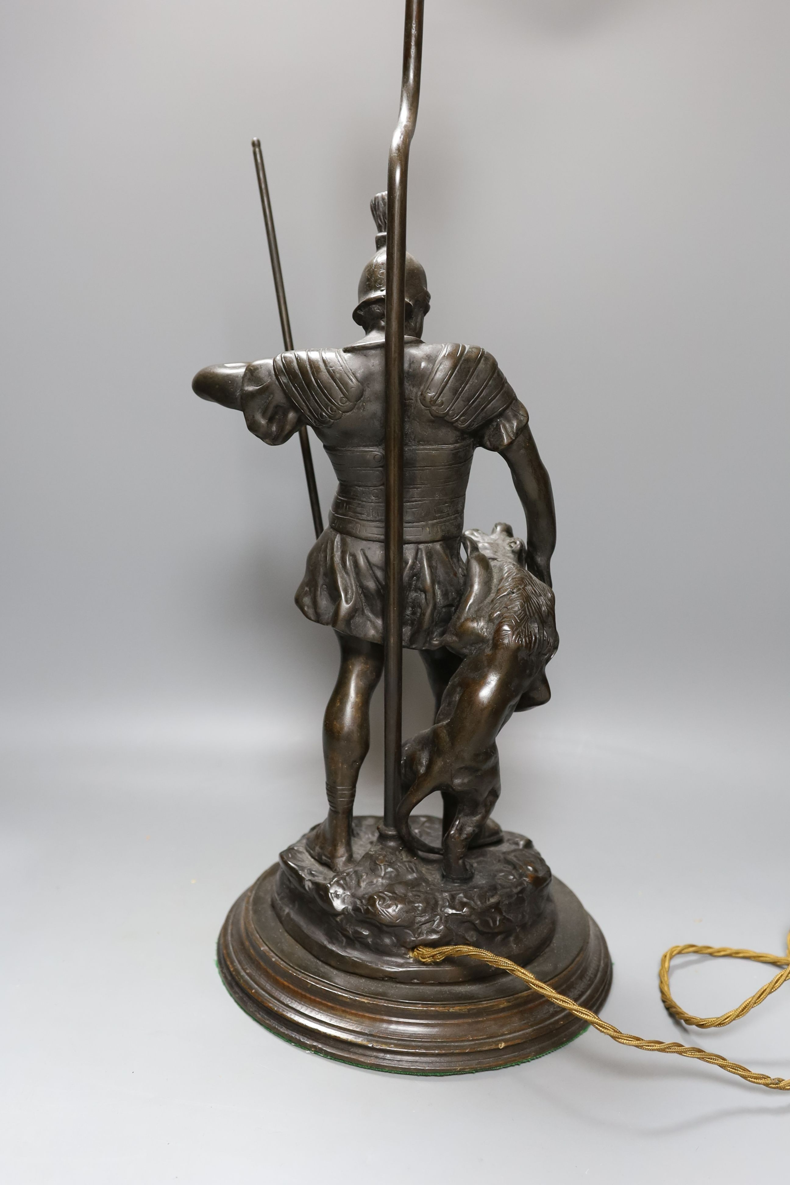 A bronze ‘gladiator’ lamp base. Total height 62cm